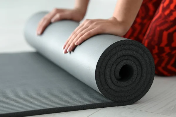 Young Woman Rolling Yoga Mat Closeup Hands — Stock Photo, Image