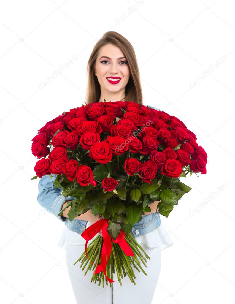 Beautiful young woman with bouquet of roses on white background