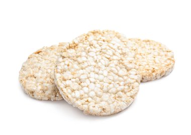 Beyaz arka plan üzerinde gevrek pirinç kek. Sağlıklı snack