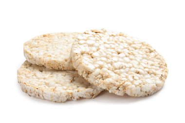 Beyaz arka plan üzerinde gevrek pirinç kek. Sağlıklı snack