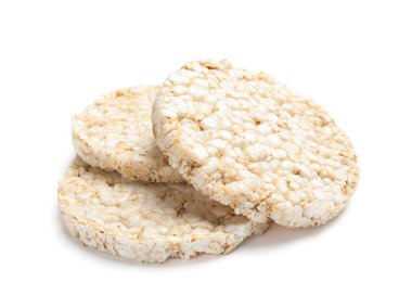 Beyaz arka plan üzerinde gevrek pirinç kek. Sağlıklı snack