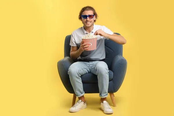 Emotional Man Glasses Popcorn Sitting Armchair Cinema Show Color Background — Stock Photo, Image