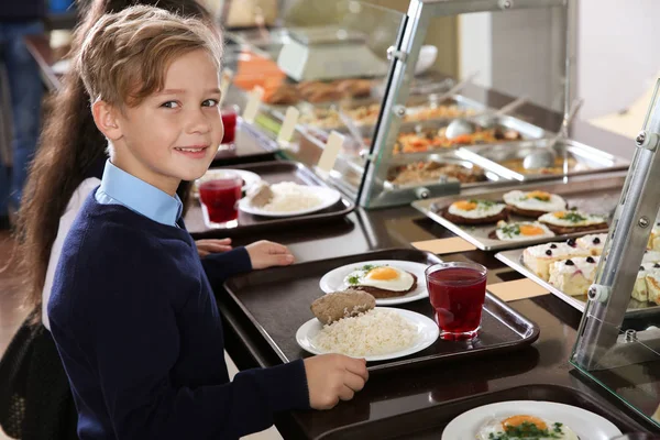 https://st4.depositphotos.com/16122460/23727/i/450/depositphotos_237278508-stock-photo-children-serving-line-healthy-food.jpg
