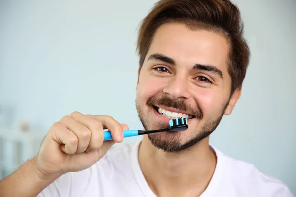 Portrait Young Man Toothbrush Blurred Background — Stock Photo, Image