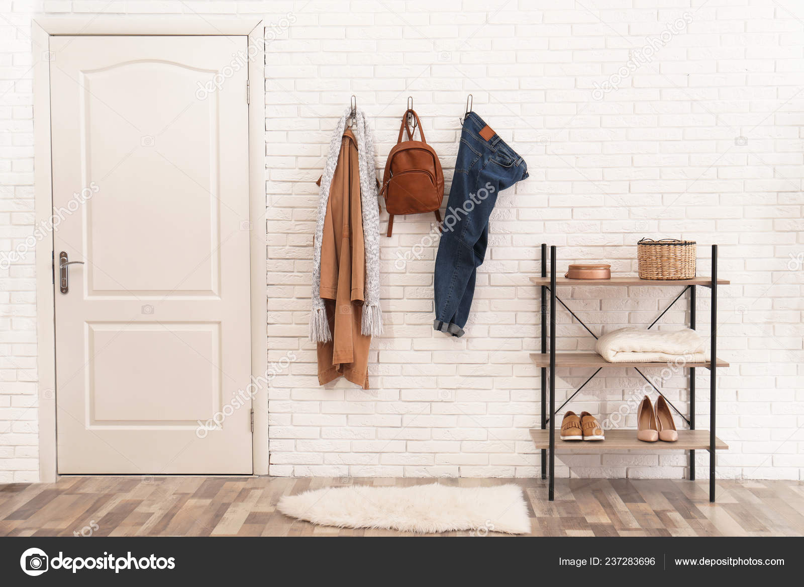 Stylish Hallway Interior Door Clothes Hanging Brick Wall
