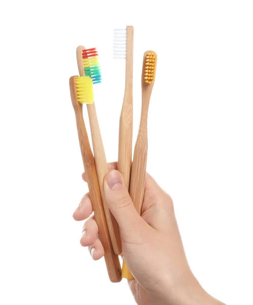 Mulher Segurando Escovas Dentes Madeira Fundo Branco — Fotografia de Stock
