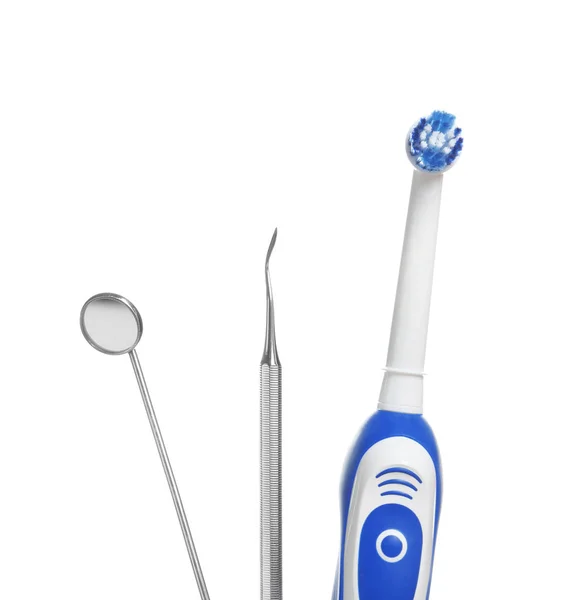 Professionelle Zahnwerkzeuge Und Elektrische Zahnbürste Isoliert Auf Weiß — Stockfoto