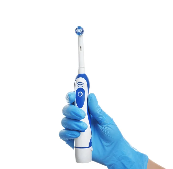 Zahnarzt Hält Elektrische Zahnbürste Auf Weißem Hintergrund — Stockfoto