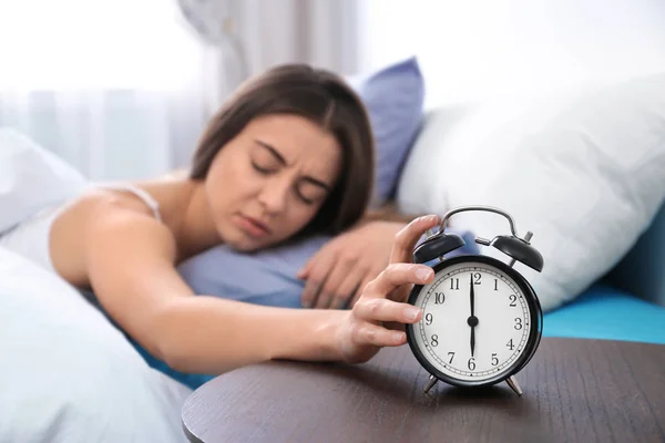 Young Woman Turning Alarm Clock Morning Bedtime — Stock Photo, Image