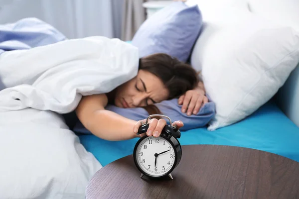 Young Woman Turning Alarm Clock Morning Bedtime — Stock Photo, Image