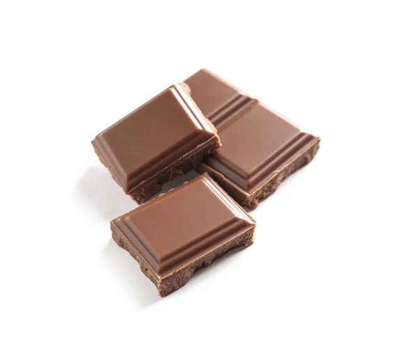 Kousky Chutné Mléčné Čokolády Bílém Pozadí — Stock fotografie