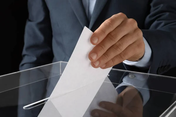 Man Putting His Vote Ballot Box Black Background Closeup — Stock Photo, Image