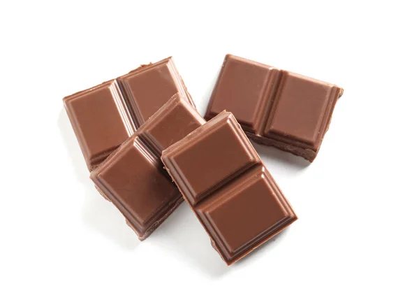 Pieces Tasty Milk Chocolate White Background Top View — Stock Photo, Image