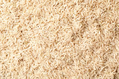 Arka plan, üstten görünüm olarak ham kahverengi pirinç