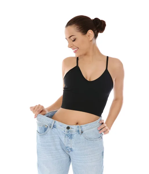 Schlanke Frau Übergroßen Jeans Auf Weißem Hintergrund Gewichtsverlust — Stockfoto