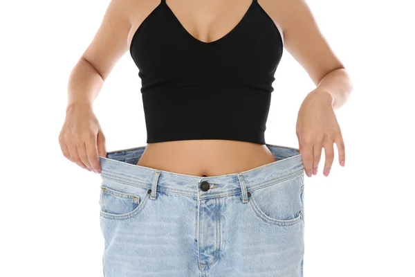Slim Woman Oversized Jeans White Background Closeup Weight Loss — Stock Photo, Image