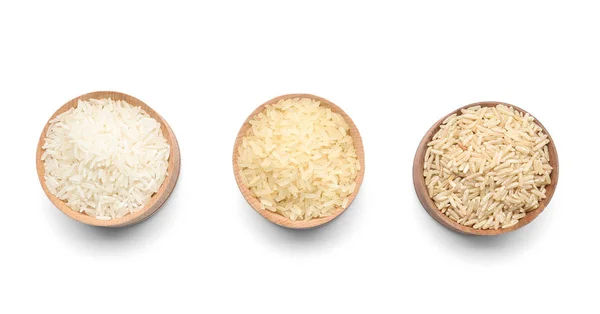 Schalen Mit Verschiedenen Arten Von Ungekochtem Reis Auf Weißem Hintergrund — Stockfoto
