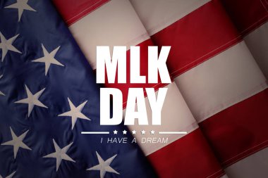Arka plan, üstten görünüm olarak ABD bayrağı. Martin Luther King günü için poster