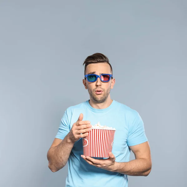 Emotional Man Glasses Popcorn Cinema Show Grey Background — Stock Photo, Image