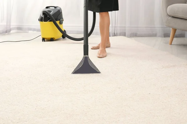 Woman Removing Dirt Carpet Vacuum Cleaner Indoors Closeup Space Text — Stock Photo, Image