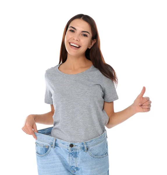 Schlanke Frau Übergroßen Jeans Auf Weißem Hintergrund Gewichtsverlust — Stockfoto
