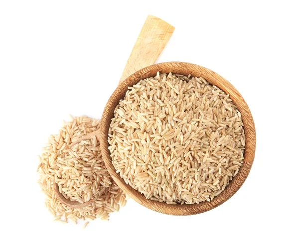 Schüssel Und Löffel Mit Rohem Braunen Reis Auf Weißem Hintergrund — Stockfoto