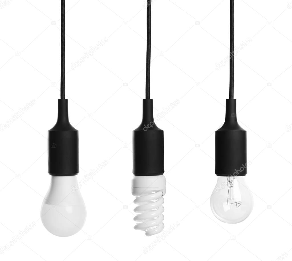 Set with different lamp bulbs on white background