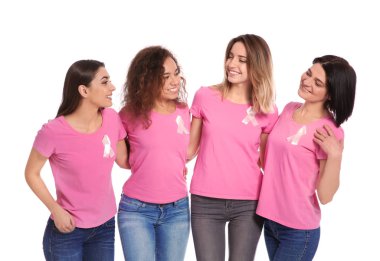 Ipek kurdele Divan ışık duvarının yakınında olan kadınların grup. Meme kanseri bilinçlendirme kavramı