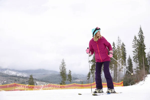 Female Skier Slope Resort Space Text Winter Vacation — Stock Photo, Image