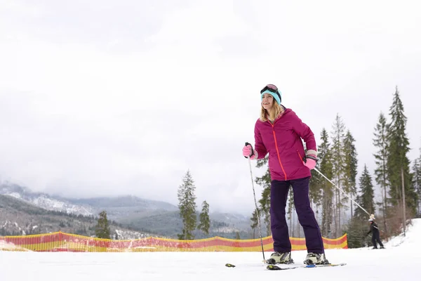 Female Skier Slope Resort Space Text Winter Vacation — Stock Photo, Image