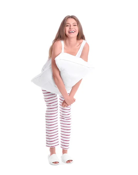 白い背景の上の首枕とパジャマで幸せな若い女 — ストック写真