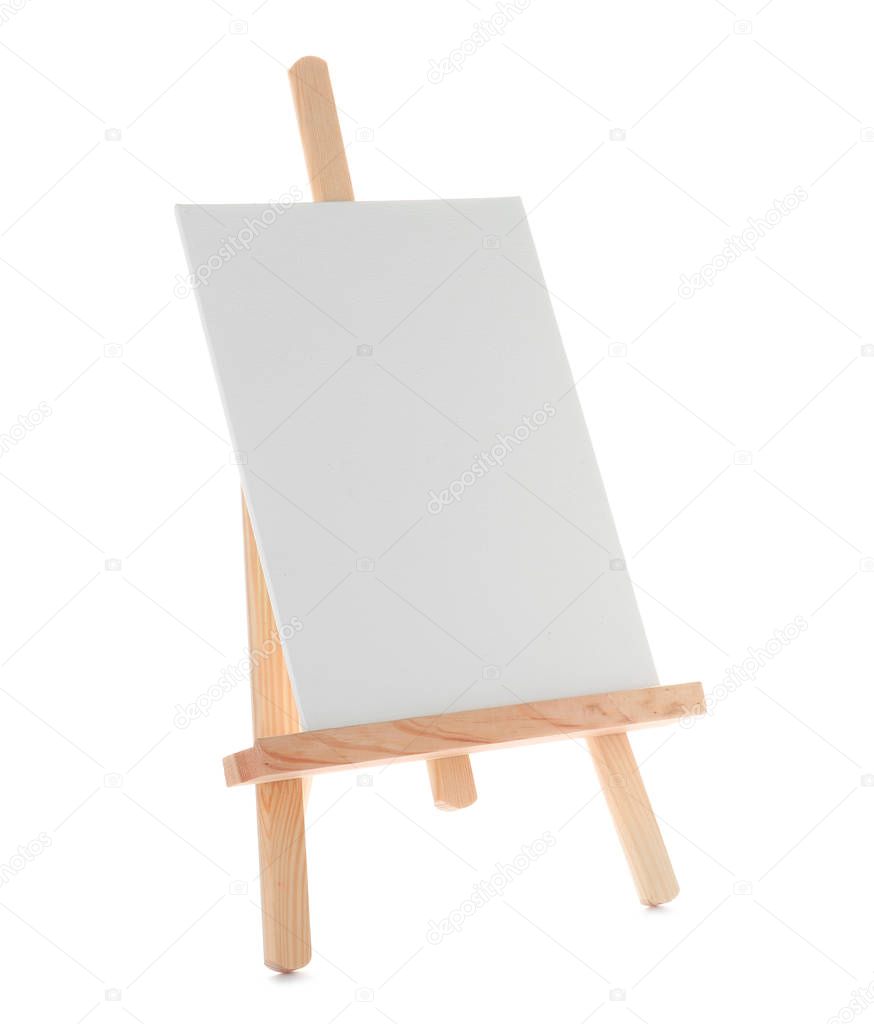 Wooden easel with blank canvas board on white background. Children's painting