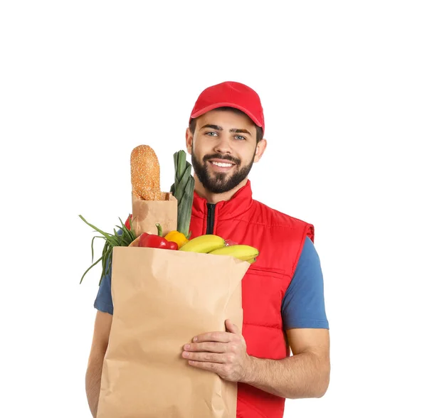 Mann Hält Papiertüte Mit Frischen Produkten Auf Weißem Hintergrund Essenslieferdienst — Stockfoto