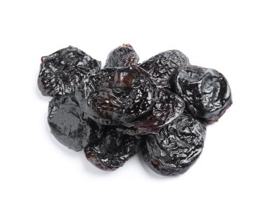 Heap of tasty prunes on white background. Dried fruit as healthy snack clipart