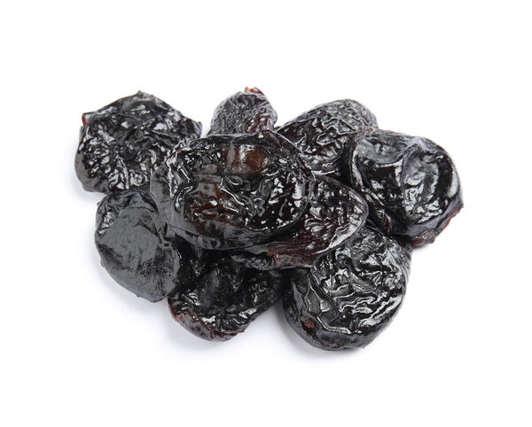 Heap of tasty prunes on white background. Dried fruit as healthy snack