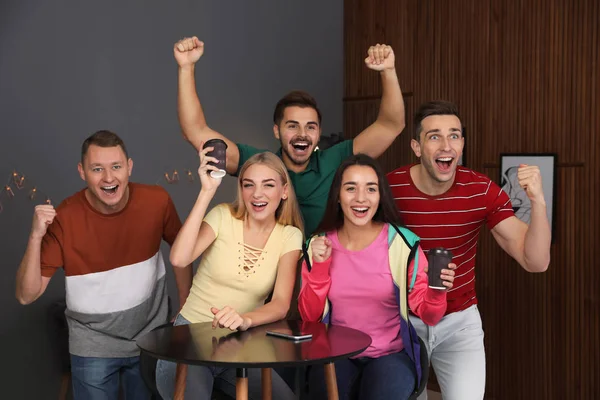 Group Friends Celebrating Victory Home — Stock Photo, Image