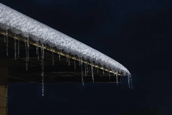 House Roof Snow Icicles Night Closeup — Zdjęcie stockowe