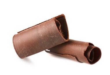 Beyaz arka planda dekorasyon için lezzetli çikolata bukleleri