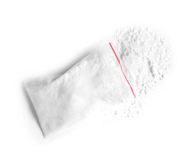 Cocaine in plastic bag on white background, top view clipart