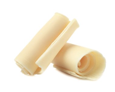 Beyaz arka planda dekorasyon için lezzetli çikolata bukleleri