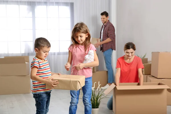 Happy Family Unpacking Boxes New House Moving Day — Stock Photo, Image