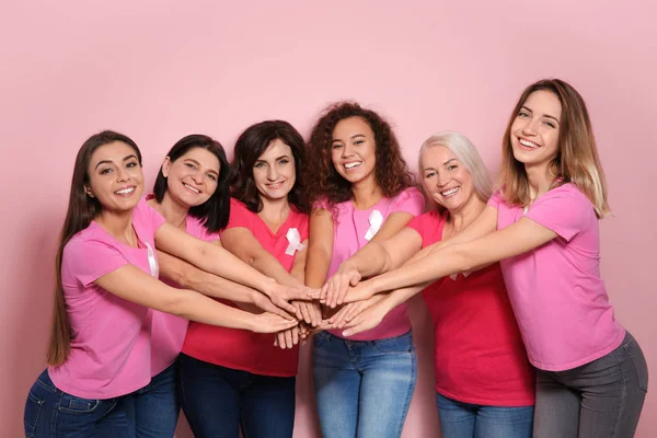 Group Women Silk Ribbons Joining Hands Color Background Breast Cancer — Stock Photo, Image
