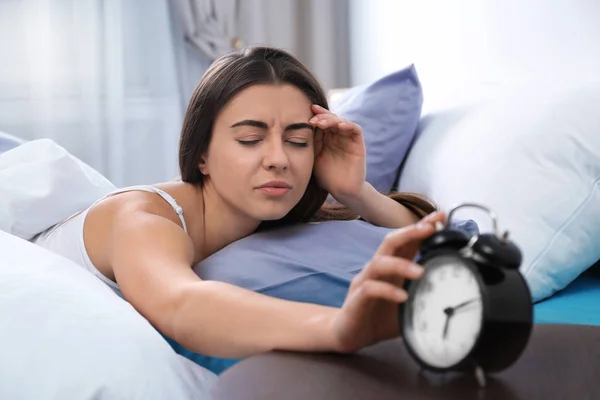 Young Woman Turning Alarm Clock Morning Bedtime — Stock Photo, Image