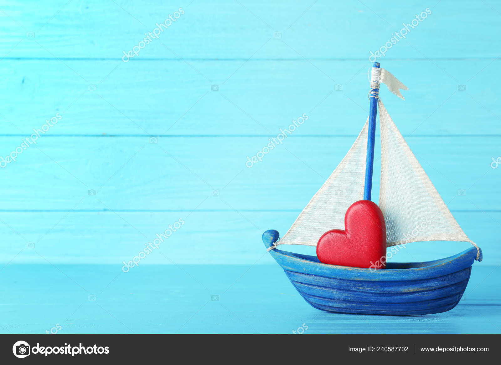 red toy boat
