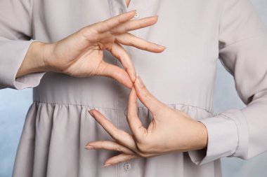 Woman showing word interpreter, closeup. Sign language clipart