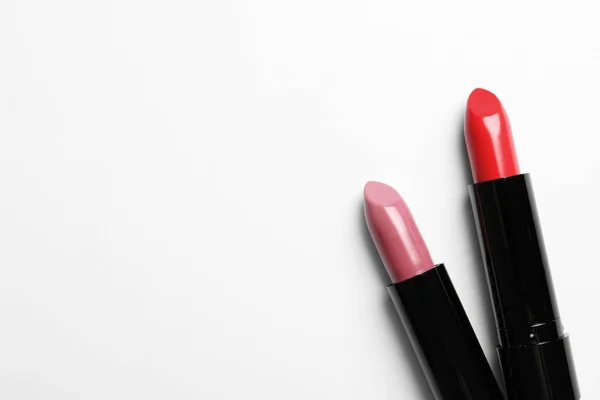 Different Lipsticks Space Text White Background Top View — Stock Photo, Image