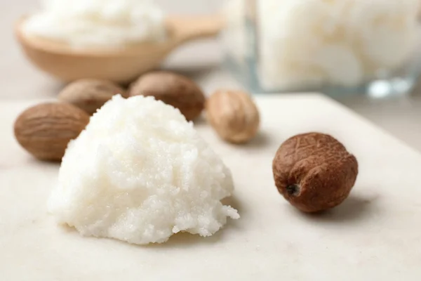 Shea Butter Nuts Marble Board Closeup — Stock Photo, Image