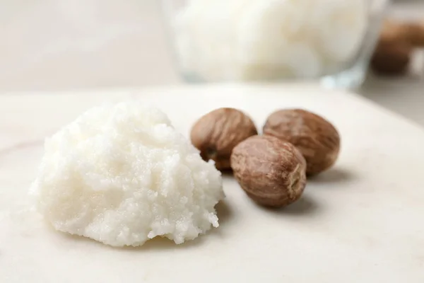 Shea Butter Nuts Marble Board Closeup — Stock Photo, Image