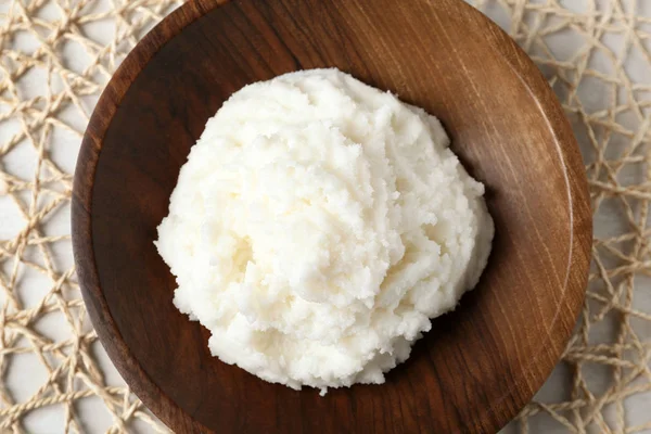 Shea Butter Wooden Bowl Wicker Mat Top View — Stock Photo, Image