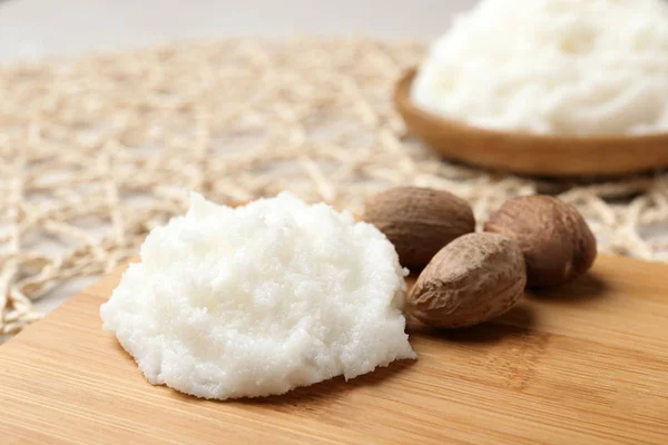 Shea Butter Nuts Wooden Board Closeup — Stock Photo, Image